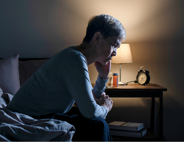 Woman in bed who is sleeping