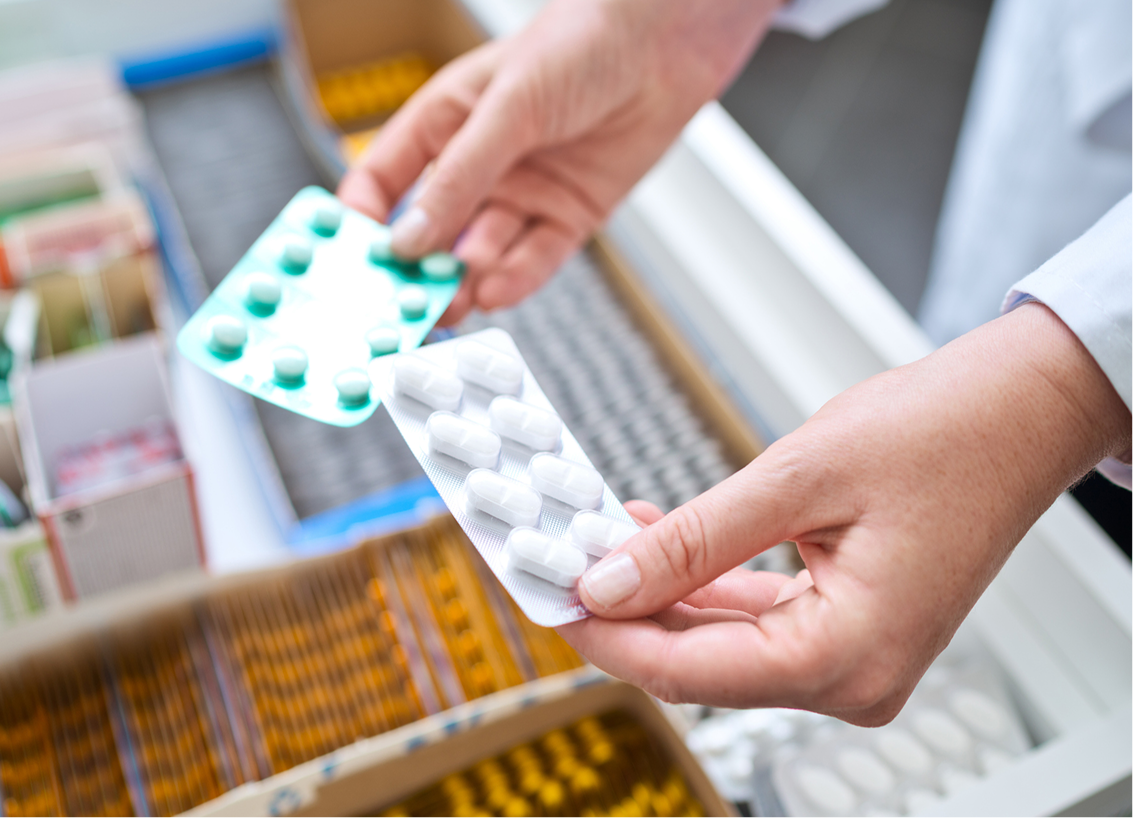 Doctor showing medications