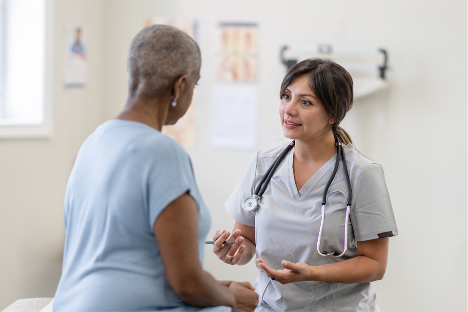 Woman talking to her doctor
