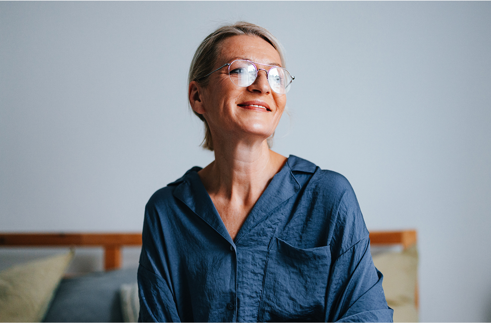 Woman getting up from a restful sleep
